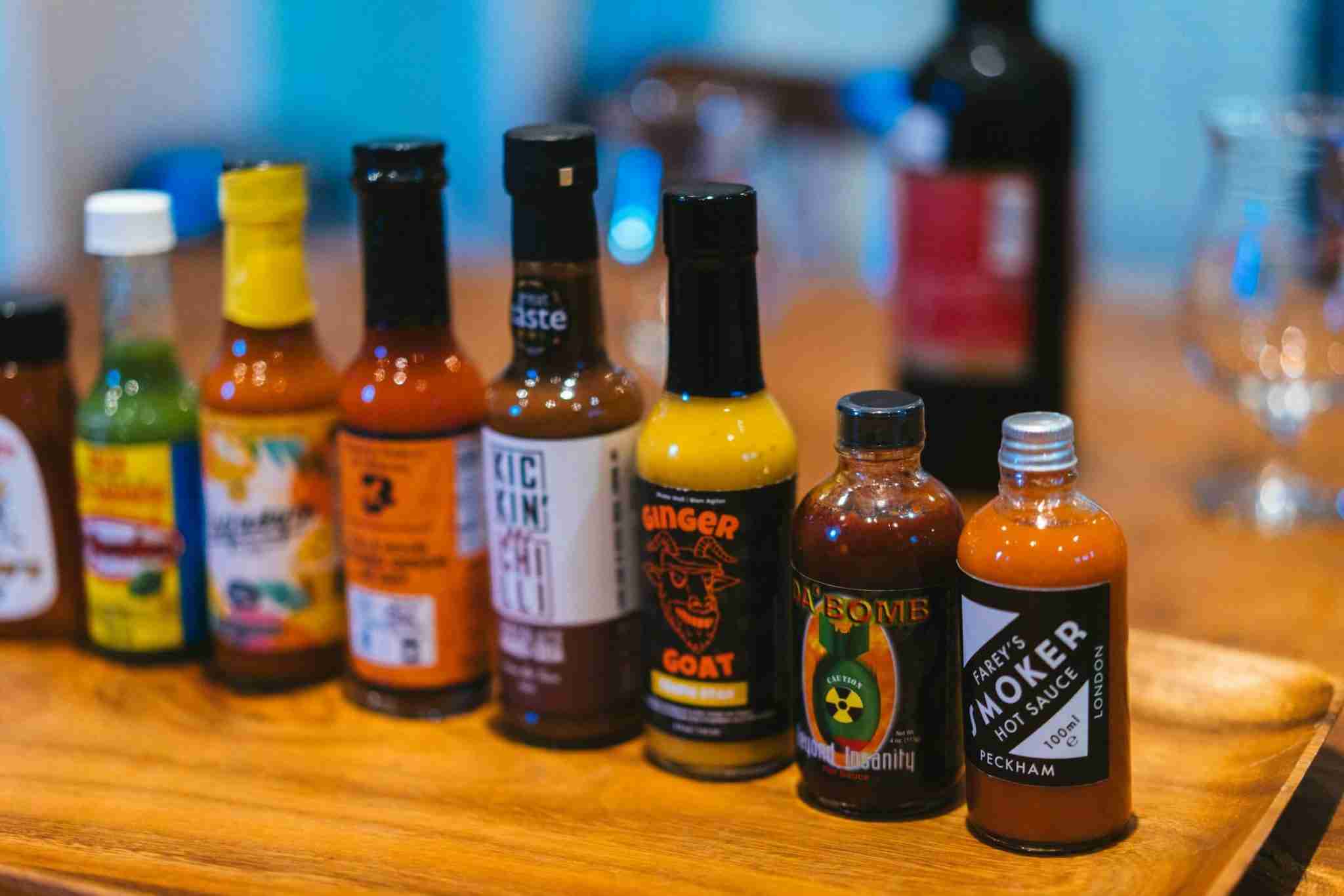 a row of hot sauces